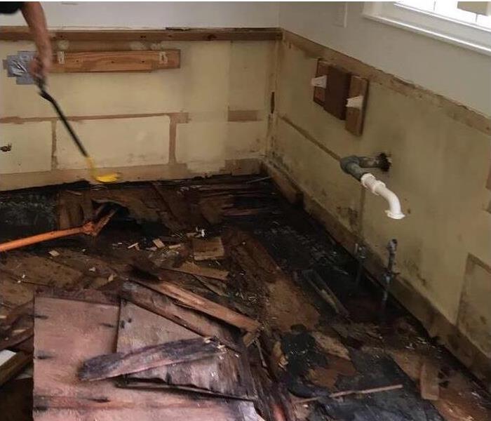 Image of a kitchen with water damage that needed all of its contents removed