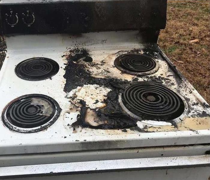 Fire damaged stove after a grease fire